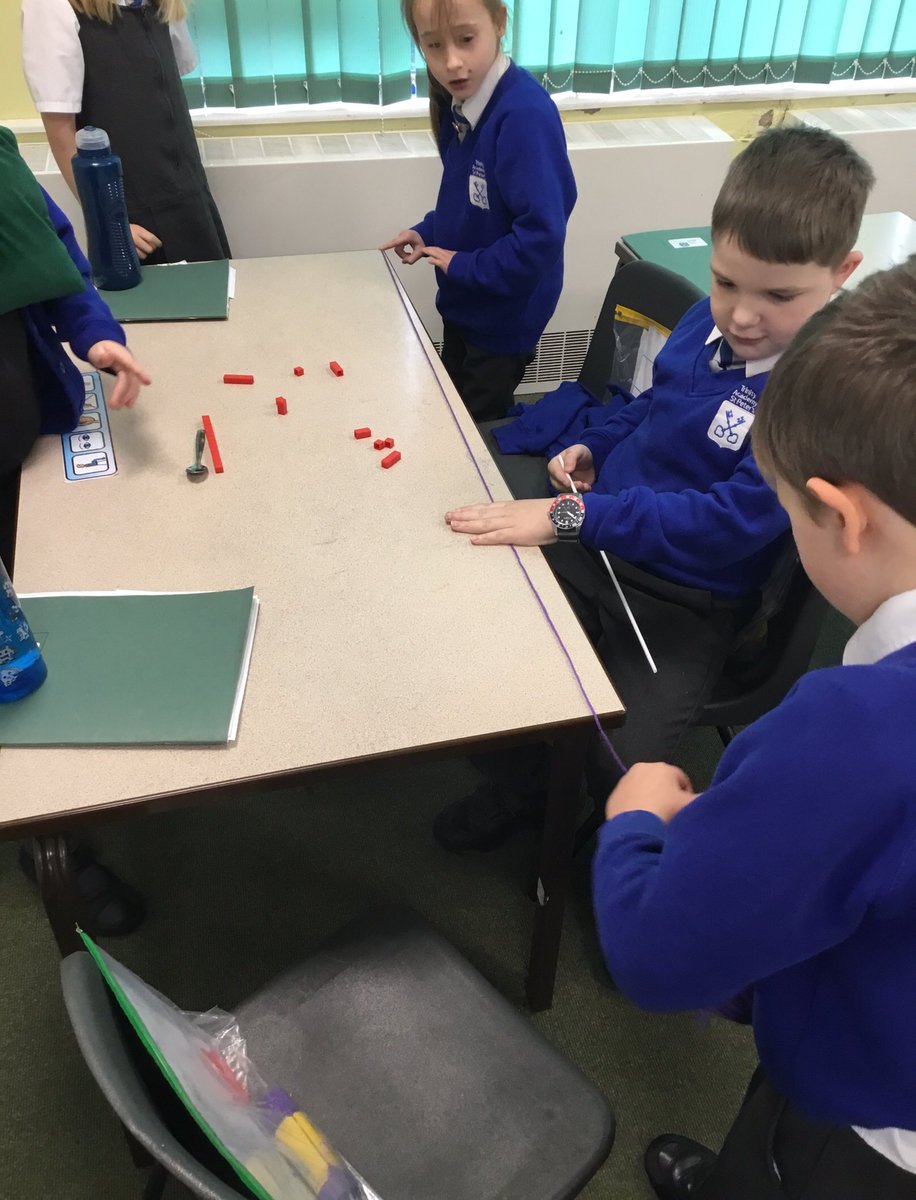 TrinityAcadStP's tweet photo. In maths we have been using non-standard measurements to measure a variety of items within the classroom, including some of our friends. Can you guess how many paper clips it took to measure the table? #EveryoneCanMaths #Whiterosemaths https://t.co/2l6FkMsjTH