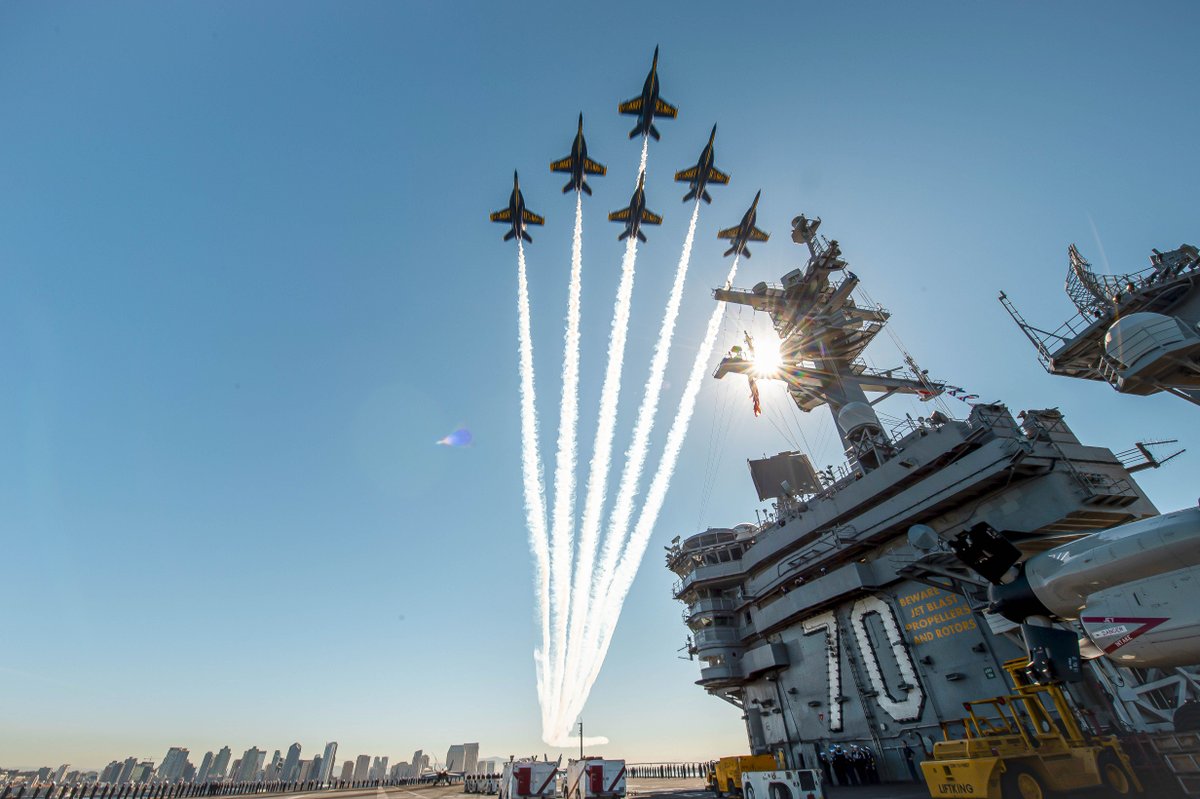 The U.S. Navy Flight Demonstration Squadron, the Blue Angels, fly over Nimitz-class aircraft carrier USS Carl Vinson (CVN 70) as it arrives at it's homeport of San Diego.🇺🇸⚓ 📸Photo by Mass Communication Specialist 2nd Class Haydn N. Smith
