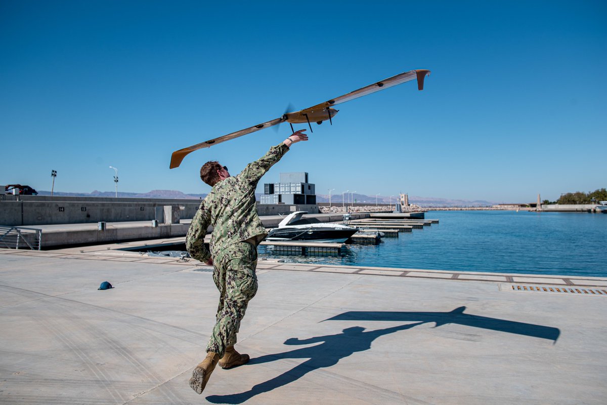 IntelWalrus's tweet photo. 🇺🇸US and 🇯🇴Jordanian sailors were 📸 playing with an interesting little drone at the Intl Maritime Exercise/Cutlass Express 22 training event in Aqaba, Jordan. A @MarineInstrumen M5D Airfox is equipped with solar panels and batteries rather than the usual combustion engine. https://t.co/6oTlPooAt1