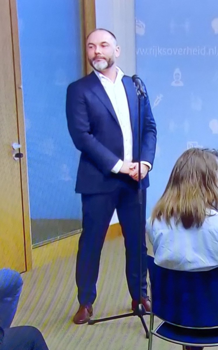 dakraemer's tweet photo. What aria is the dude with the microphone gonna sing once the Dutch health minister is done with the Corona Press Conference? #barihunks https://t.co/oKP3xMqifg