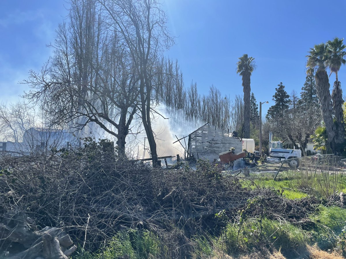 CALFIRE_ButteCo's tweet photo. #KentuckyFire(update) The fire has burned a small barn and moved into the vegetation assisted by the wind. Units have stopped the forward spread that has progressed into the wild-land. https://t.co/EPe83W1Gpt