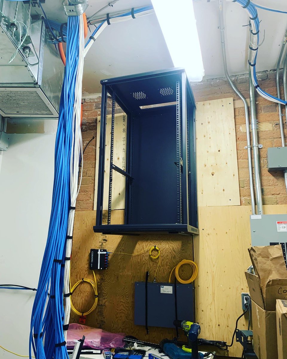 Computation_Ca's tweet photo. Installation of a 22u network cabinet that will house and organize this customer’s patch panels, router, switch, wifi controller and UPS. Placed at a height that is a deterrent to accidental tinkering or impact, the cabinet is secured with 10 #Tapcon anchors that can support https://t.co/CqSbf5UivQ