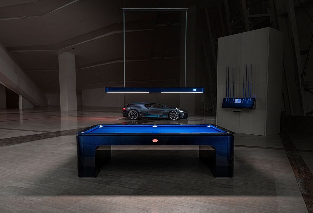 Bugatti_NB's tweet photo. For those who truly appreciate a masterpiece that perfectly combines technology and design, the @bugatti and @ixo_carbon Pool Table perfectly morphs them into an exhilarating work of art.

The table includes a Leveling Manual System to ensure that the table is perfectly leveled. https://t.co/pbeg61LvLf