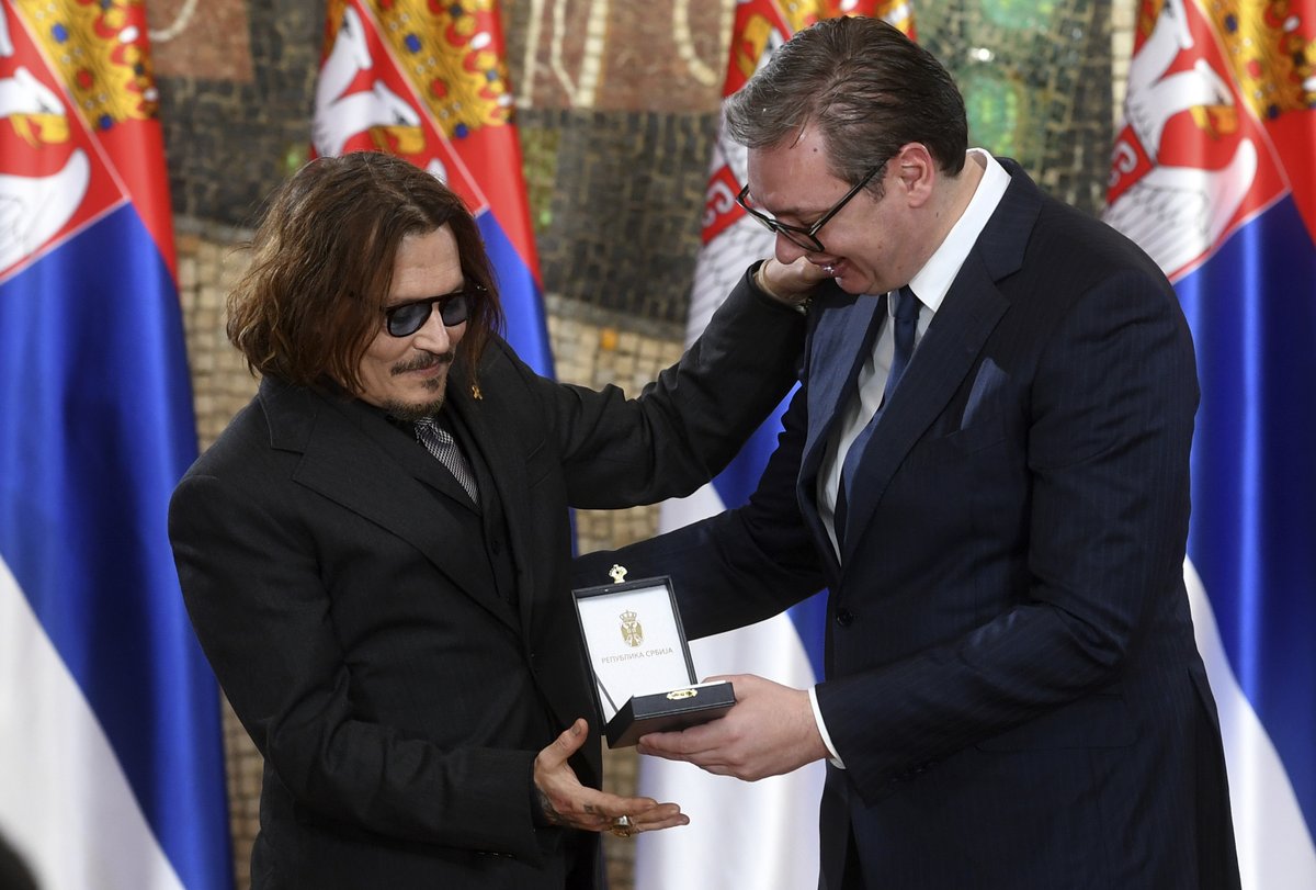 OnTheRedCarpet's tweet photo. CONGRATULATIONS!  Johnny Depp has been awarded the Gold Medal of Merit, on the occasion of Serbia's Statehood Day, in Belgrade, Serbia.
#JohnnyDepp #entertainment #celebrity 
(Photo: Serbian Presidential Press Service via AP) https://t.co/Whf1f1tL81