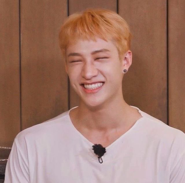 bang chan and his beautiful smile has not changed since he was a kid