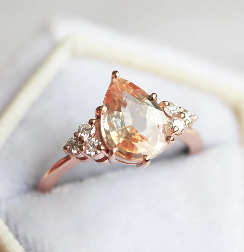 moddlinc's tweet photo. Pastel Peach Sapphire Ring | Shop Now https://t.co/FYlrCS2oCV

#jewelry #Singapore #fashion #style https://t.co/ZSQYmgyQPF