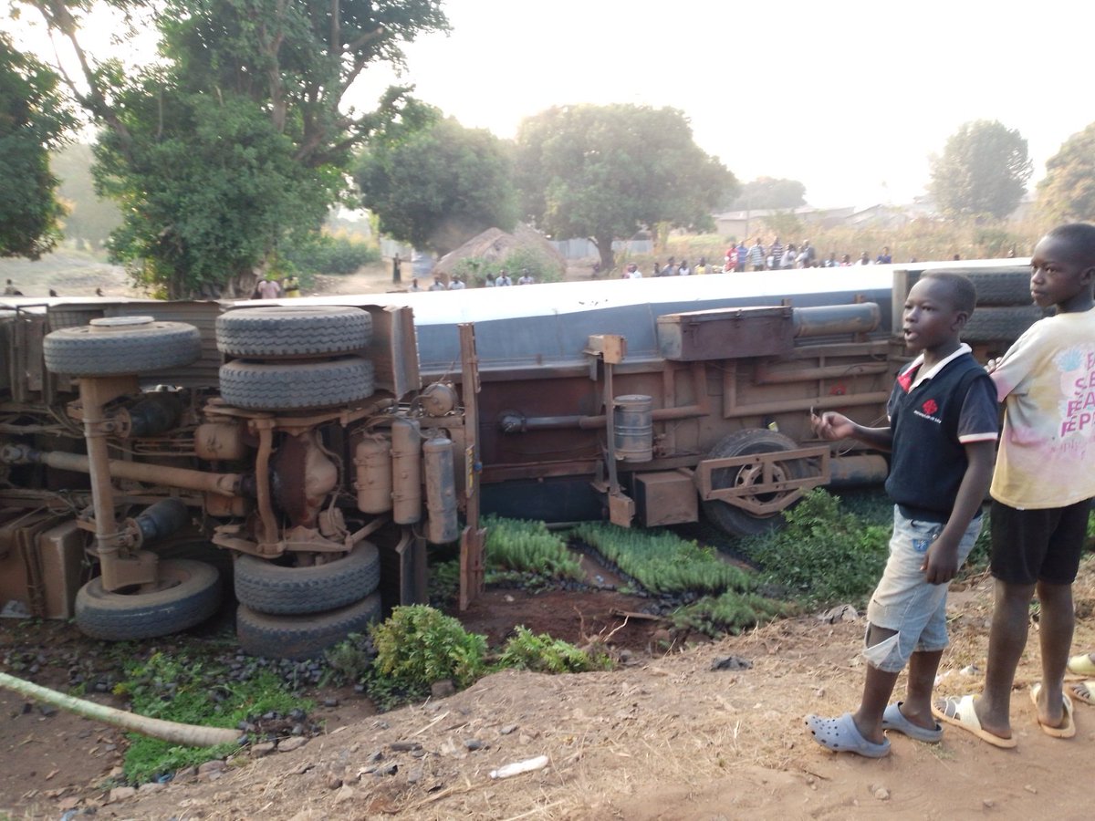 MJanerous's tweet photo. So sad this morning an accident happened along kampala Gulu high way where by the the danger Petro vehicle was over taking the double cabin and later lost control &amp; fell side ways the driver survived but the driver of the double cabin was rushed to the main hospital https://t.co/7z3QMidf2h