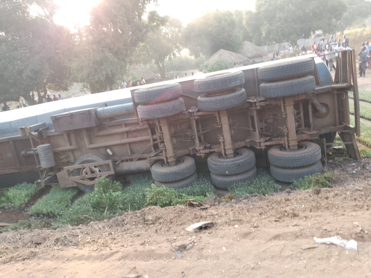 MJanerous's tweet photo. So sad this morning an accident happened along kampala Gulu high way where by the the danger Petro vehicle was over taking the double cabin and later lost control &amp; fell side ways the driver survived but the driver of the double cabin was rushed to the main hospital https://t.co/7z3QMidf2h