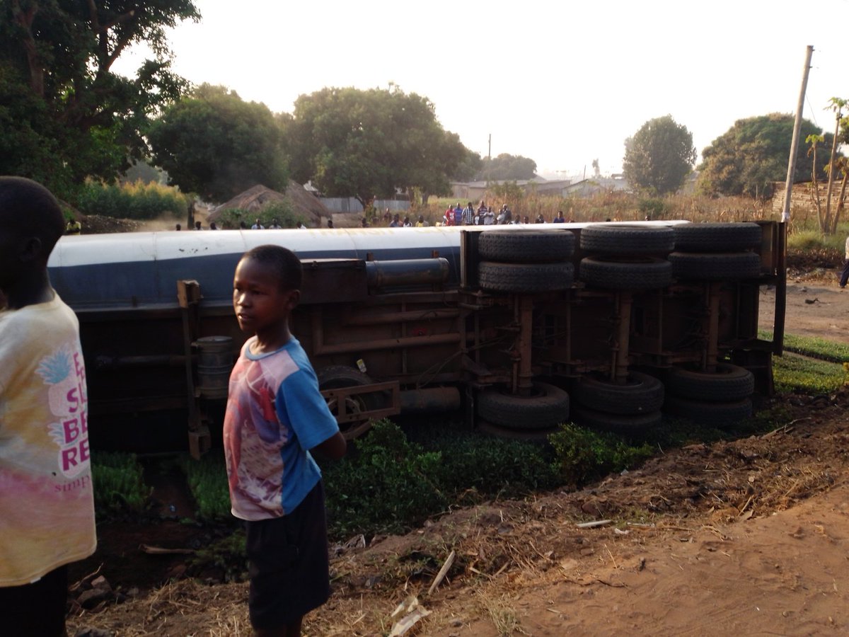 MJanerous's tweet photo. So sad this morning an accident happened along kampala Gulu high way where by the the danger Petro vehicle was over taking the double cabin and later lost control &amp; fell side ways the driver survived but the driver of the double cabin was rushed to the main hospital https://t.co/7z3QMidf2h