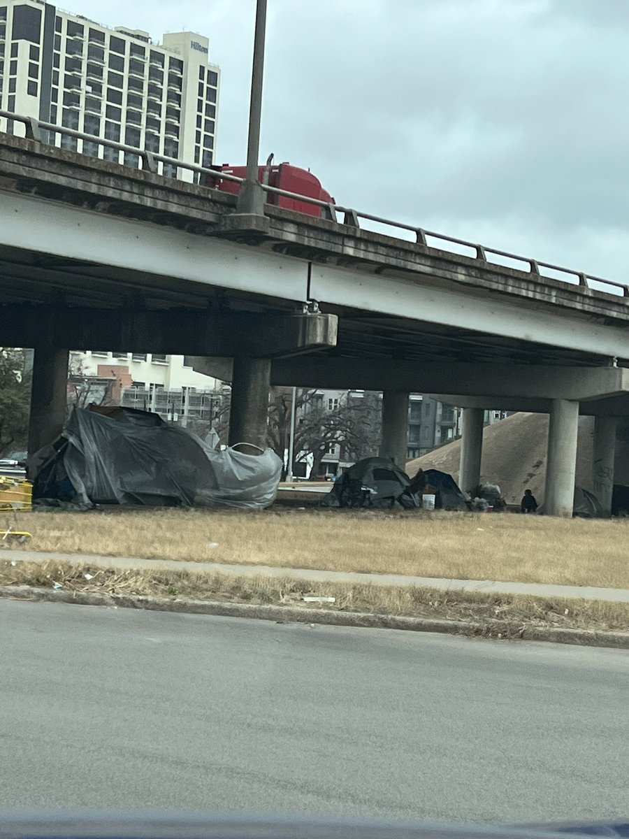 ecman054's tweet photo. @MayorAdler Villages popping up all over the city again! Such a disgraceful leader! @KVUE @KXAN_News why don’t you hold these people accountable? @GovAbbott you’re also part of the problem! @TxDOTAustin clean it up!! https://t.co/TyOgP2a1XU