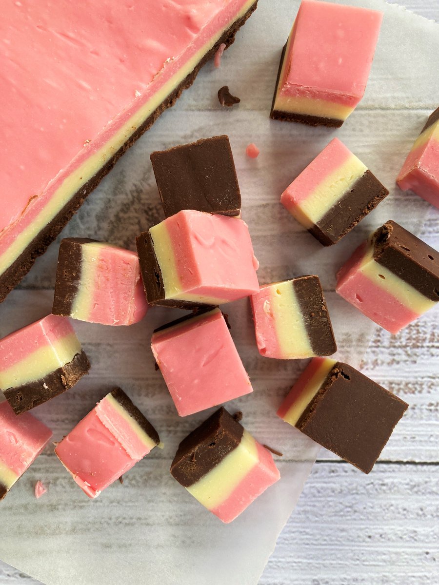 An excellent combination of Nesquik and Carnation Condensed Milk: Three layered chocolate, strawberry, white chocolate fudge! 💛🍓🤎 Fancy giving it a go? See the recipe: spr.ly/6018KTsaE