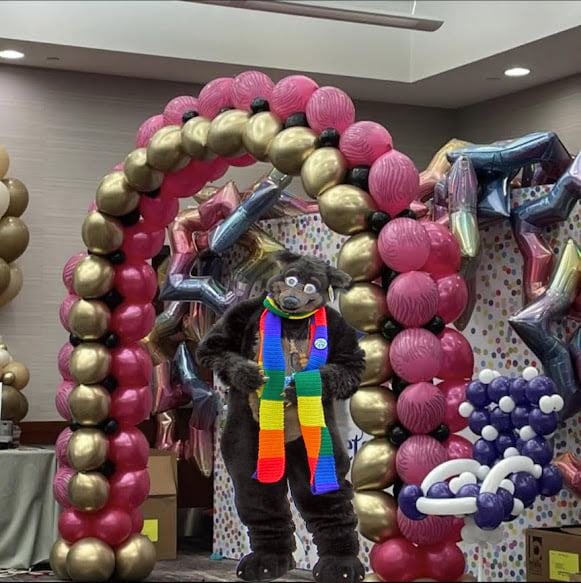 THE_BJBUTTONS's tweet photo. #Waldolf edited in, with one of the many #Balloon #arches on display at #Float2022 #fursuit #fursuiter #fursuiting #bear #costume https://t.co/YvpvKpPcnm