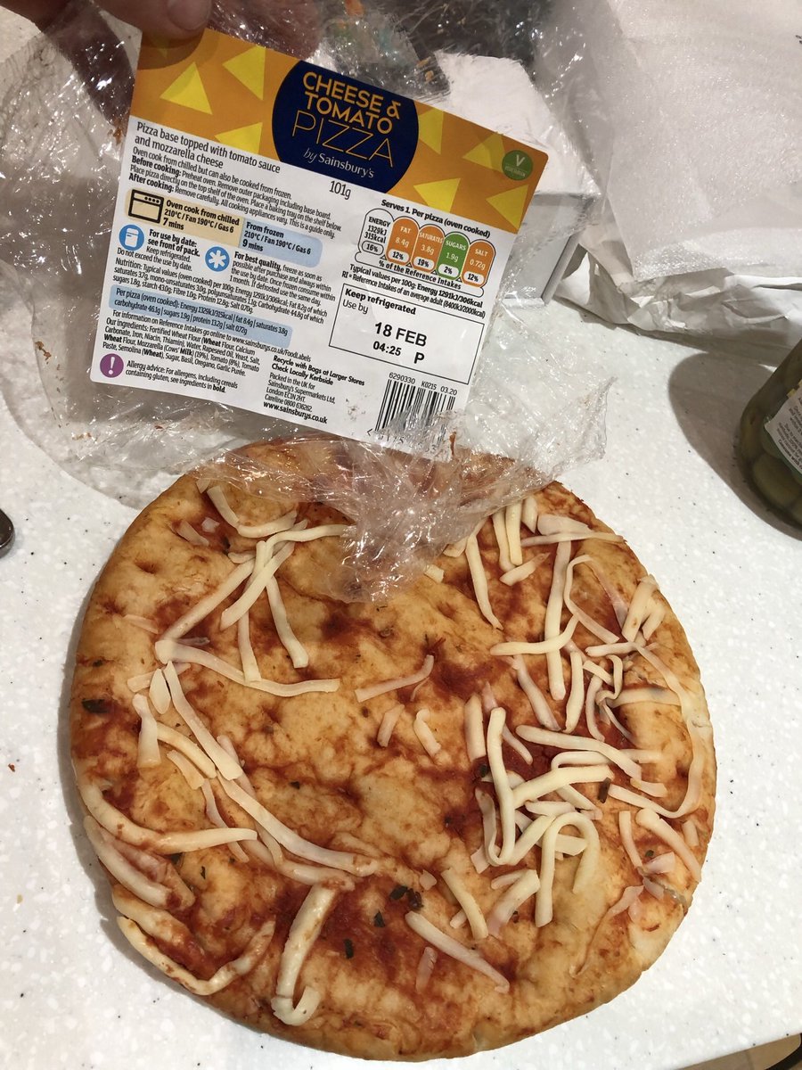 Disappointed 3 year old today with his <a href="/sainsburys/">Sainsbury's</a> (‘cheese and’) tomato pizza... Ingenious use of the label to hide the cheese hole in the middle…