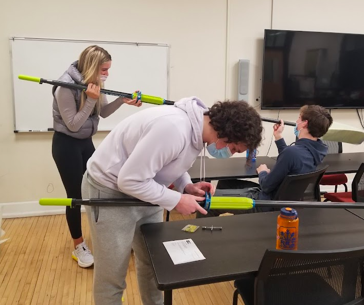 pennchartercrew's tweet photo. Junior rowers Duncan, Ella, and James made quick work of prep'ing new team oars for the season. And, bringing back an old team tradition, James received an award for erg scores + great team spirit! https://t.co/6AhQYfODyn