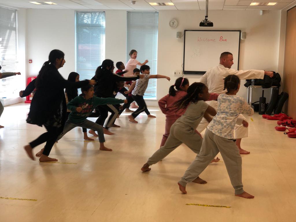 LutonSteps's tweet photo. Day 3 of ‘Adventure Activity Mornings’.Today’s theme was ‘Karate Kid’. The children enjoyed learning some fundamental karate moves & playing games as a group. Thank you to Mark from JKS Luton for the excellent session, & to our volunteer work experience students for their help. https://t.co/lv2gEvQ6Rj