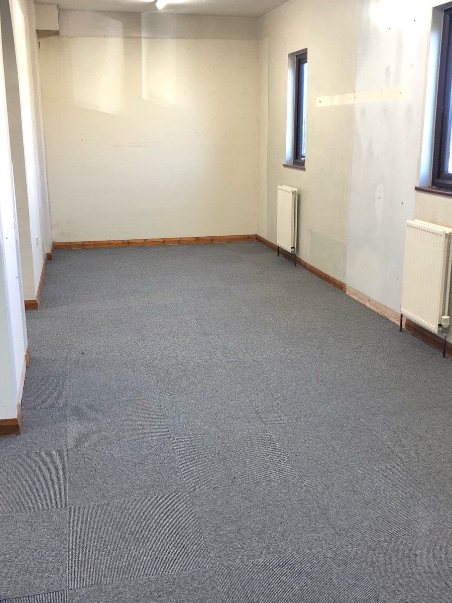 ClubSilkstone's tweet photo. Progressing rapidly! First phase of new carpet tiles laid (thanks https://t.co/2J8HHcLPeJ) and Mr President checking the lockers will fit! https://t.co/wtvhRgvT19