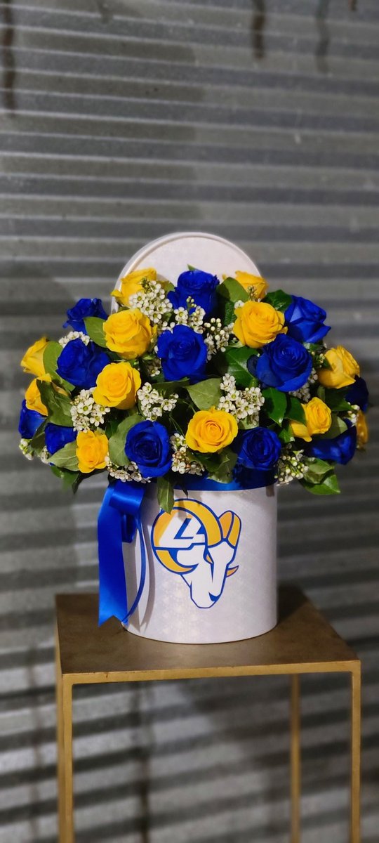FlowersPmg's tweet photo. L.A. RAMS Flower Arrangement #fox11rams #Rams #WorldChampions #SuperBowl #FlowerPower https://t.co/FkNf9ldcP4