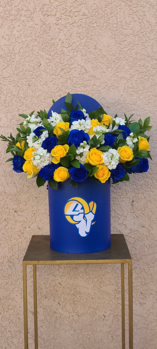FlowersPmg's tweet photo. L.A. RAMS Flower Arrangement #fox11rams #Rams #WorldChampions #SuperBowl #FlowerPower https://t.co/GncjWW4a9Q