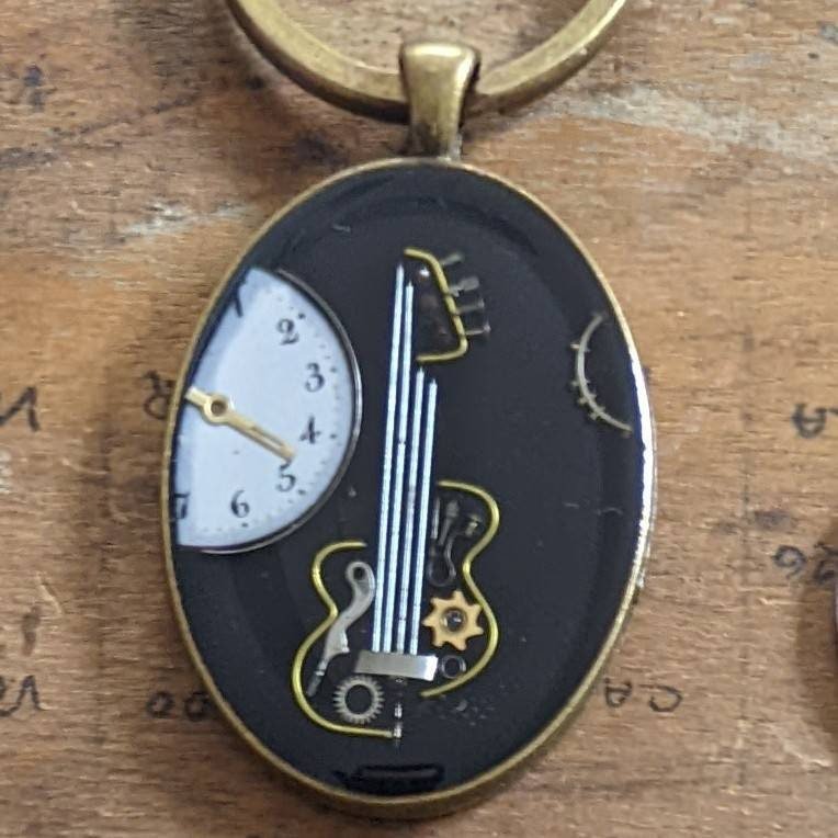 Relojearte's tweet photo. Excited to share the latest addition to my #etsy shop: Artwork featuring Musical collage vintage watches parts, pendant, necklace, original, handmade, one of a kind #keyring #recycled #watchparts #oneofakind #handmade https://t.co/kmJTQaxzBp https://t.co/Oe4k0752g4