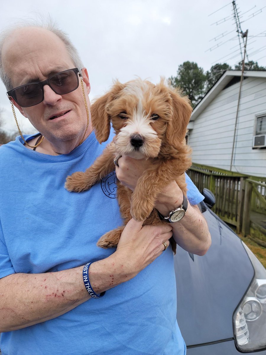 ldpeaches55's tweet photo. @donnyosmond #Puppylove how sweet. My brother with our new puppy https://t.co/yVVyIFaBny