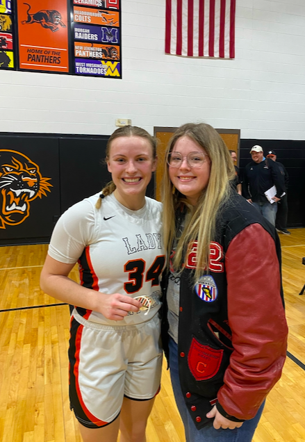 NewLexAthletics's tweet photo. After tonight's game, Crooksville Senior Athlete Grace Frame, presented Kim Kellogg with an MVL Sportsmanship Coin. The two have had some great battles over the past few seasons. Two great basketball players and representatives of their schools! https://t.co/K1ar9hIkqj
