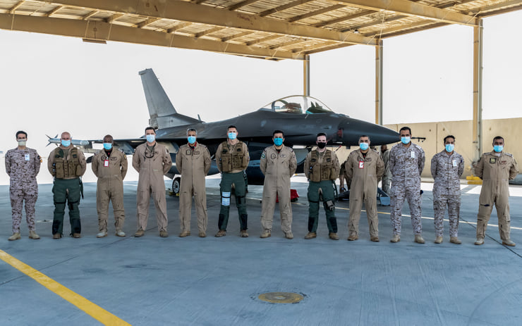 Members of the Royal Saudi Air Force and the U.S. Air Force stand for a picture during an exercise. 