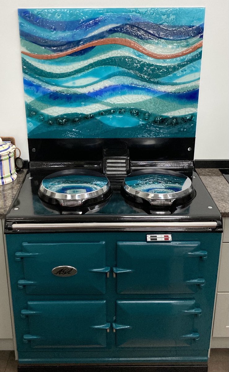 Here’s a recent commission I made for a fused glass splashback to accompany this teal Aga #Aga #fusedglass #kitchen #kitchendesign #glasssplashback #glassart #glassartanddesign #glass #glassenamels #kitchensplashback #societyofdesignercraftsmen_sdc #Devonart #Devon