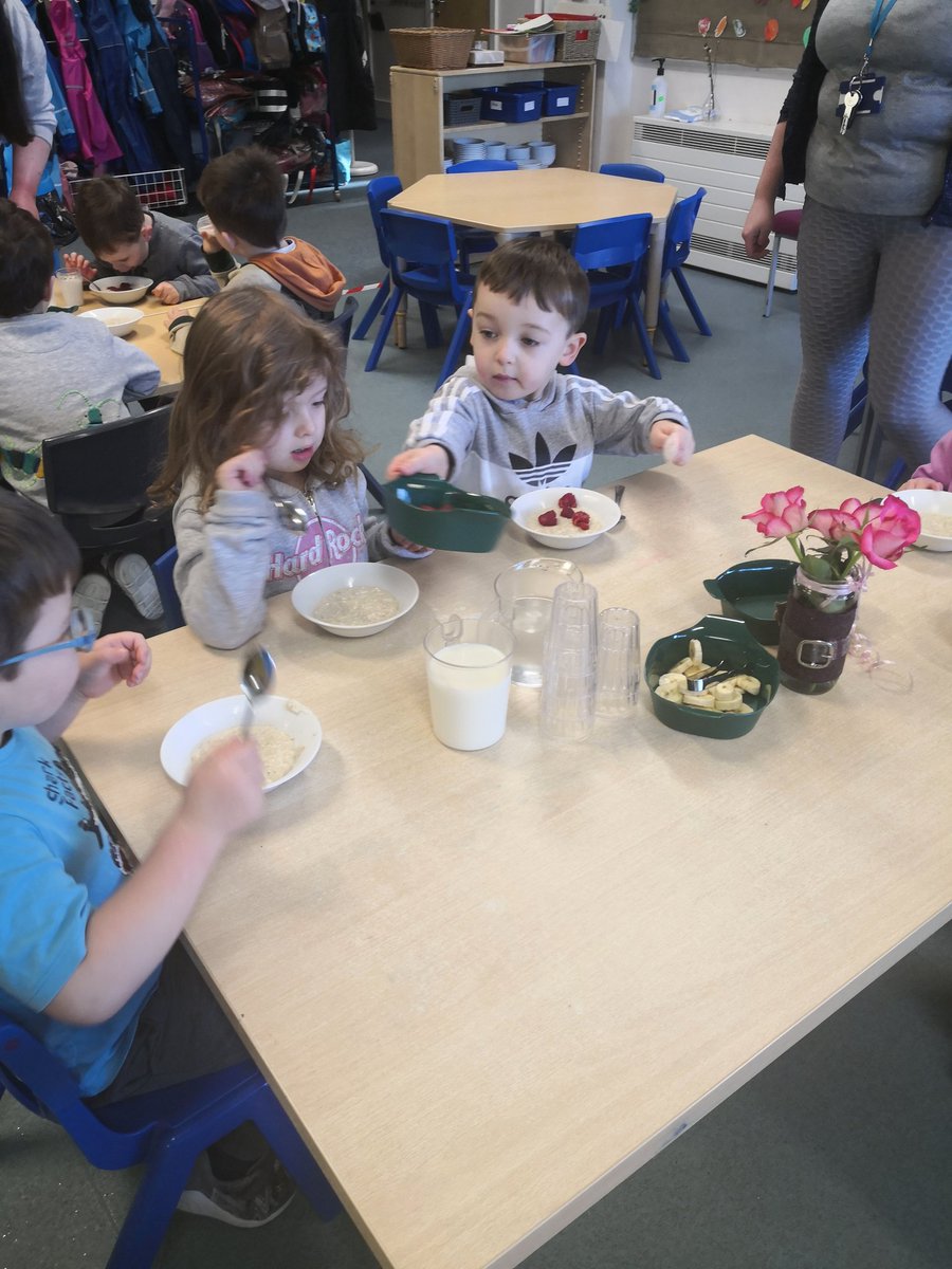 TCSoA_Nursery's tweet photo. What a cold and unpredictable day it is today. We filled our tummys this morning with cosy porridge, raspberries and banana before wrapping up for playing outside. #extendedyearsprovision #nurture #qualityexperiences @elc_pkc https://t.co/wHWBPzJEAo