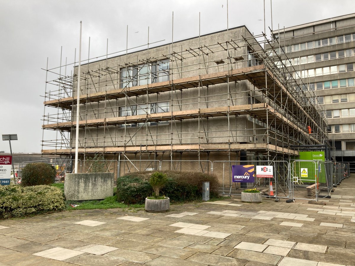 Works underway, site set up and scaffold being erected to perimeter of building at Taw View offices, Barnstaple in readiness for  insulation works as part of Devon County Council's Zero Carbon Buildings project.