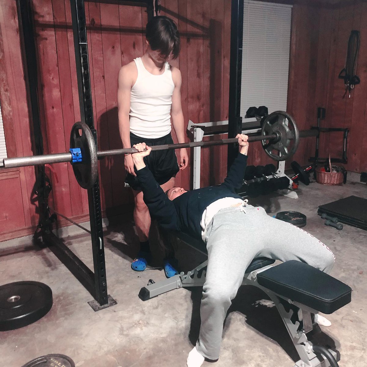 Got my pjs on, but I was hearing that clanging and rap music in the garage and just couldn’t stay away. My days are numbered of being able to match them rep for rep 😂💪. 🖤 #boymom #busymomgetsfit #garagegym