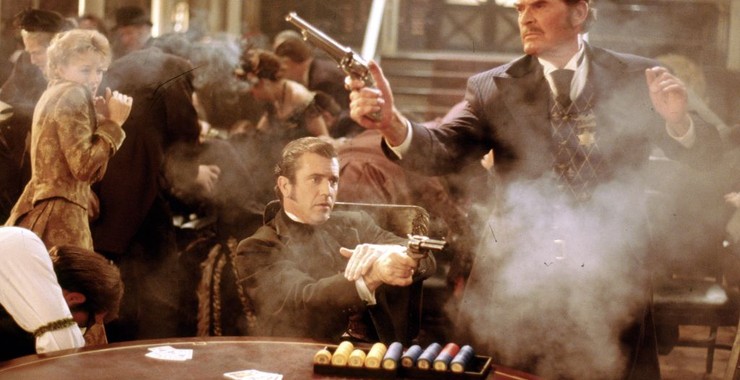 Maverick (1994) is a cocky western comedy starring Mel Gibson as a fast-talking and cowardly gambler trying to scrape together enough money to enter a once-in-a-lifetime poker tournament. Made by the Lethal Weapon crew.