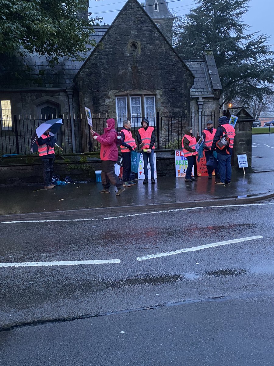 NEUCymru's tweet photo. Early start for NEU Cymru members at @HowellsSchool striking in the rain to save their pension @GDST #23Together #HandsOffOurTPS #StopFireRehire @NEUnion https://t.co/hKtF66JYcg