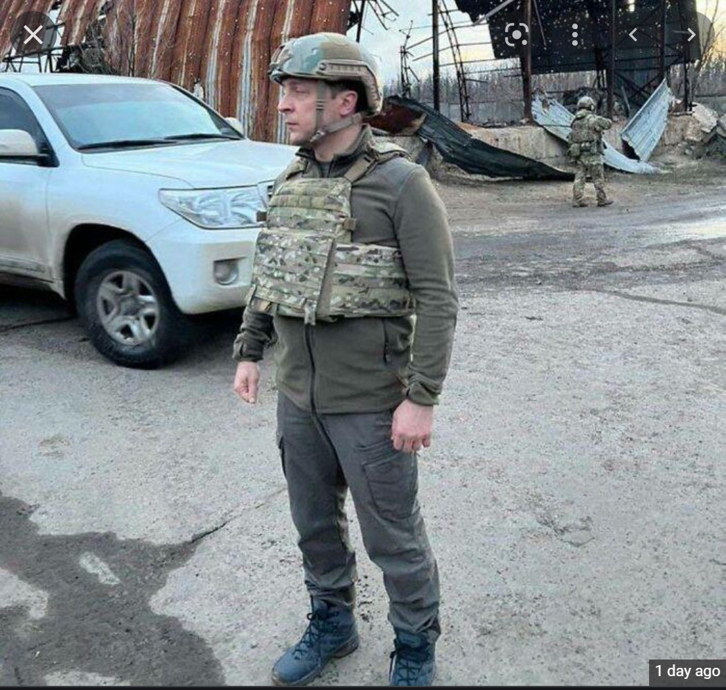 ilovepostt's tweet photo. Lot's of people are talking about how the Ukraine president is fighting with his people. However, in the images i've seen he does not have any plates in his vest. So I question if this is being used as propaganda (good or bad) or real news.  #globalstudies150 https://t.co/8aVgQX1zei
