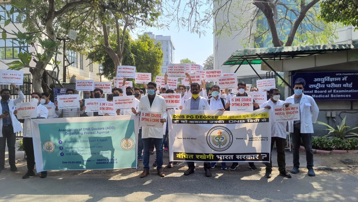 DNB Doctors protest at NBE Dwarka against paper swapping scam and low passing rates. <a href="/PMOIndia/">PMO India</a> <a href="/MoHFW_INDIA/">Ministry of Health</a> <a href="/mansukhmandviya/">Dr Mansukh Mandaviya</a> <a href="/OfficeOf_MM/">Office of Dr Mansukh Mandaviya</a> <a href="/ndtv/">NDTV</a> <a href="/PTI_News/">Press Trust of India</a>