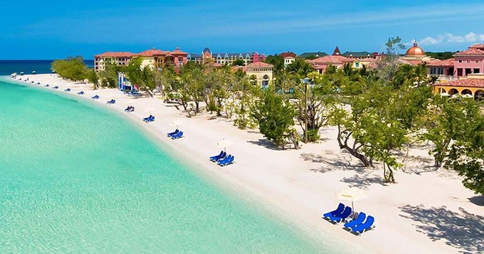Once you see the beautiful blue hues at Sandals South Coast, you'll never want to leave! 🌤️🌴🌊 best-online-travel-deals.com/beachfront-res… #jamaica #vacation #allinclusive #beach