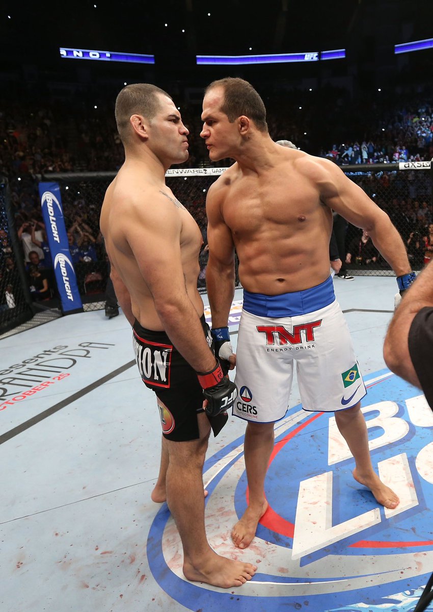 fightpicsgohard's tweet photo. Cain Velasquez meets Junior Dos Santos in the middle before their fight starts

(Texas, 2013) https://t.co/kkIR5Npgxz