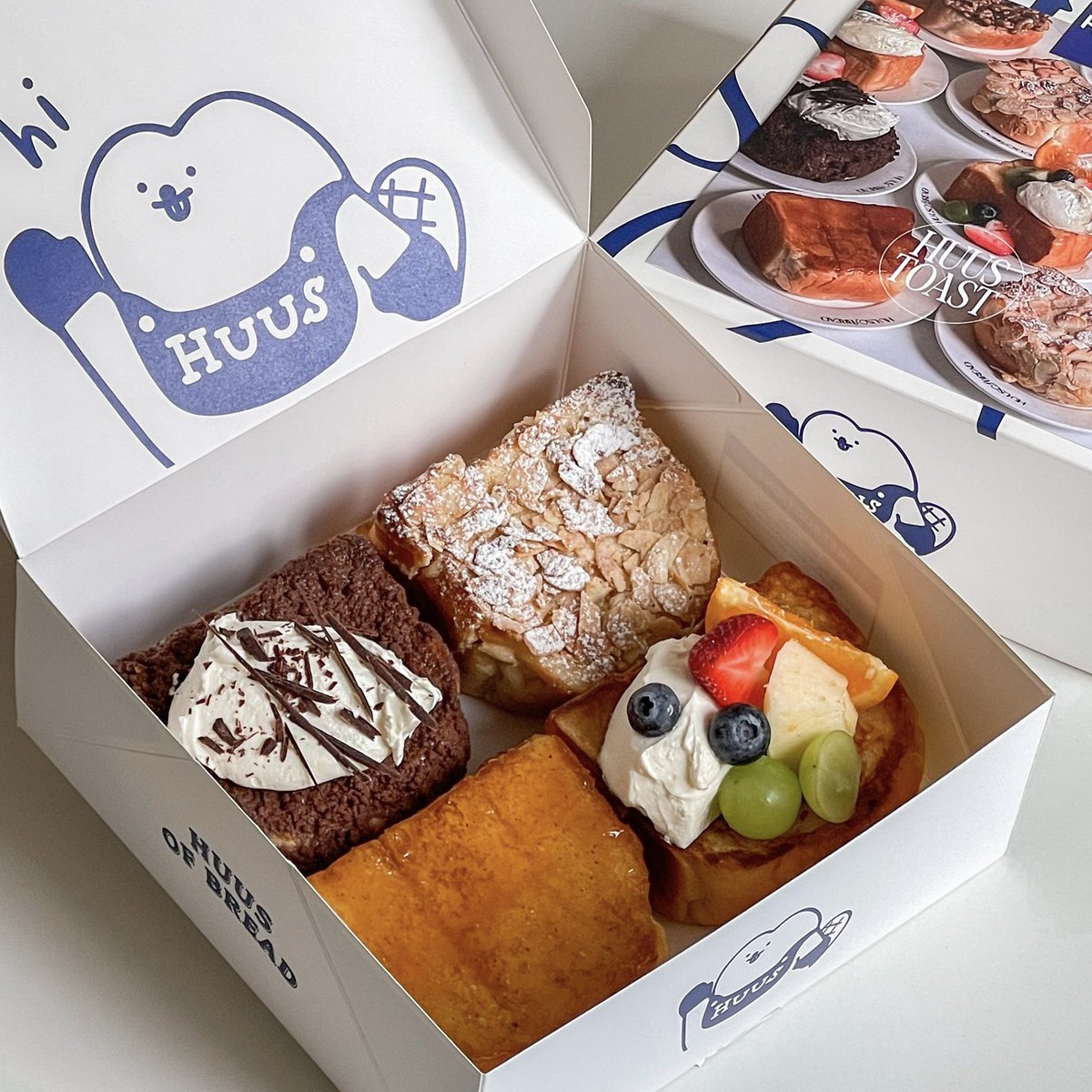 ThaNudChim's tweet photo. huus toast ของร้าน “huus of bread” อร่อยมากแม่ ที่สึด นางมี 8 หน้าแต่น้องชอบตัว Nutella กับ almond มาก เนยดี ฉ่ำ แพคเกจจิ้งน่ารักมากด้วย ขนมปังนางจะนุ่มๆ เป็น skokupan ที่ดีมาก อยากกินอีกแล้วอะ @aroii #อร่อยบอกต่อ https://t.co/GUIrPVTcY0