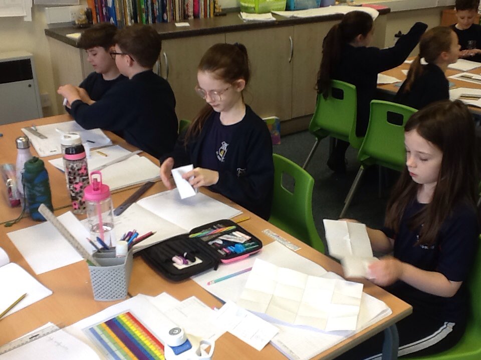 Class10JR1's tweet photo. Origami or equivalent fractions? @StAnnesOrmskirk #maths https://t.co/Eaw0rXnk1F