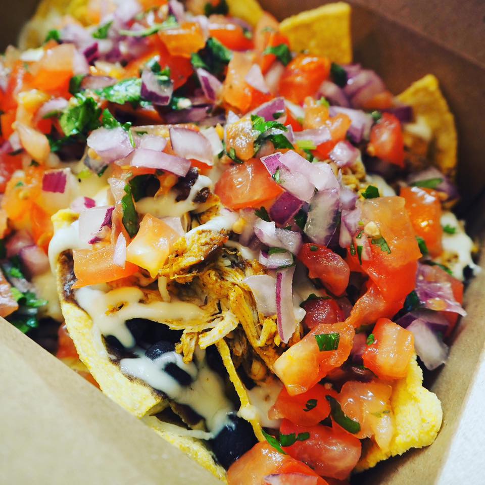 This is nacho feast.But it could be. 🎉😉 Crunchy corn chips with hand-rubbed Adobo Chicken,  super fresh salsa, black beans, and heaps of cheese. Top with FREE EXTRAS when you come see us on Rose Street for sit in or take out! 12-9pm EVERY DAY!  #FeelGoodStreetFood  #MuchachoHQ