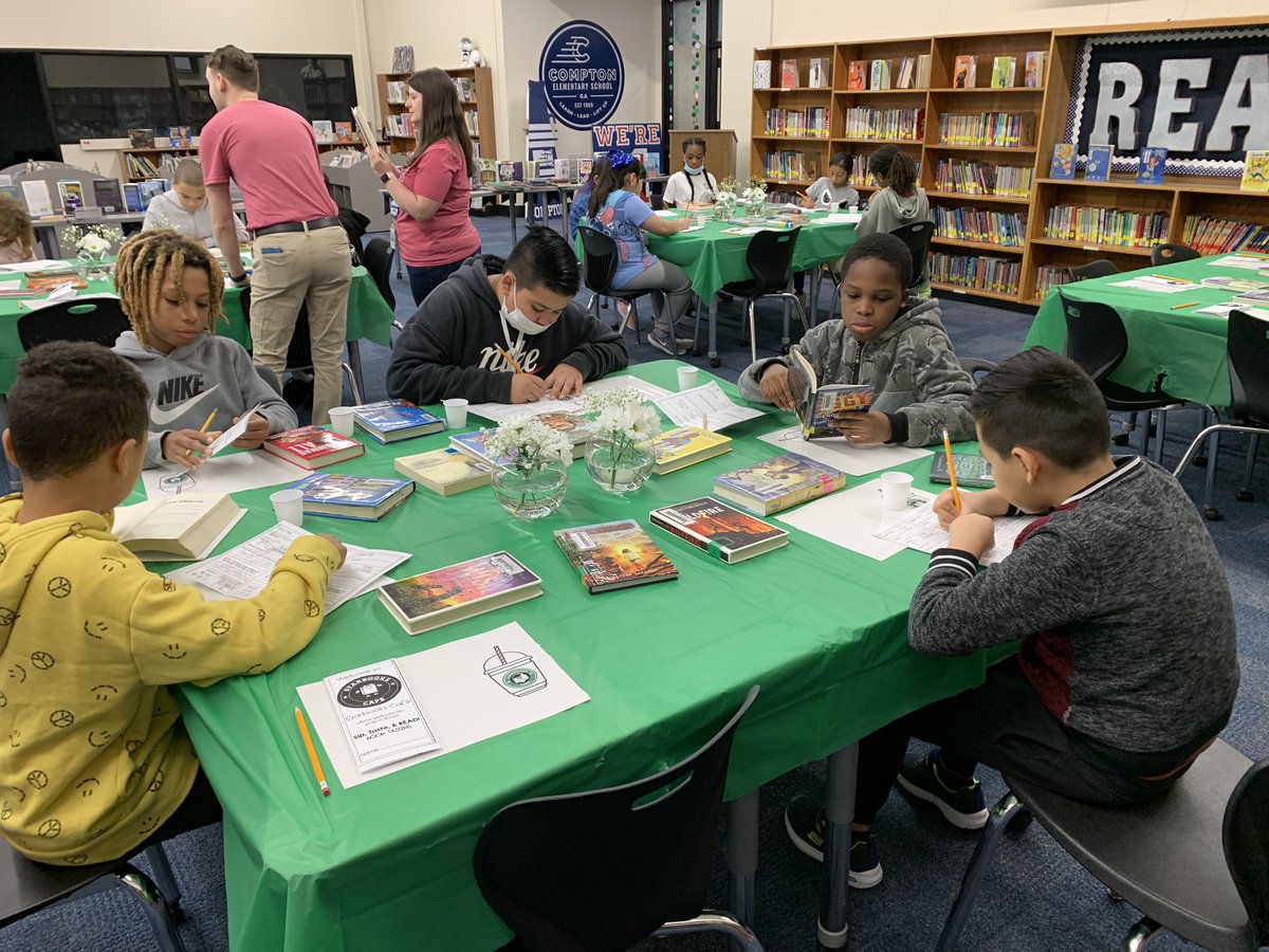 Comptoncubs's tweet photo. It is #ReadAcrossAmericaDay and the STARBOOKS CAFE is open in our Learning Commons!! Compton cubs are enjoying “tasting”lots of  books during our celebration. @CobbSchools @lairbeth1 @ACLittle23 @CCSDLibMedia https://t.co/f3VtJ5d9LY
