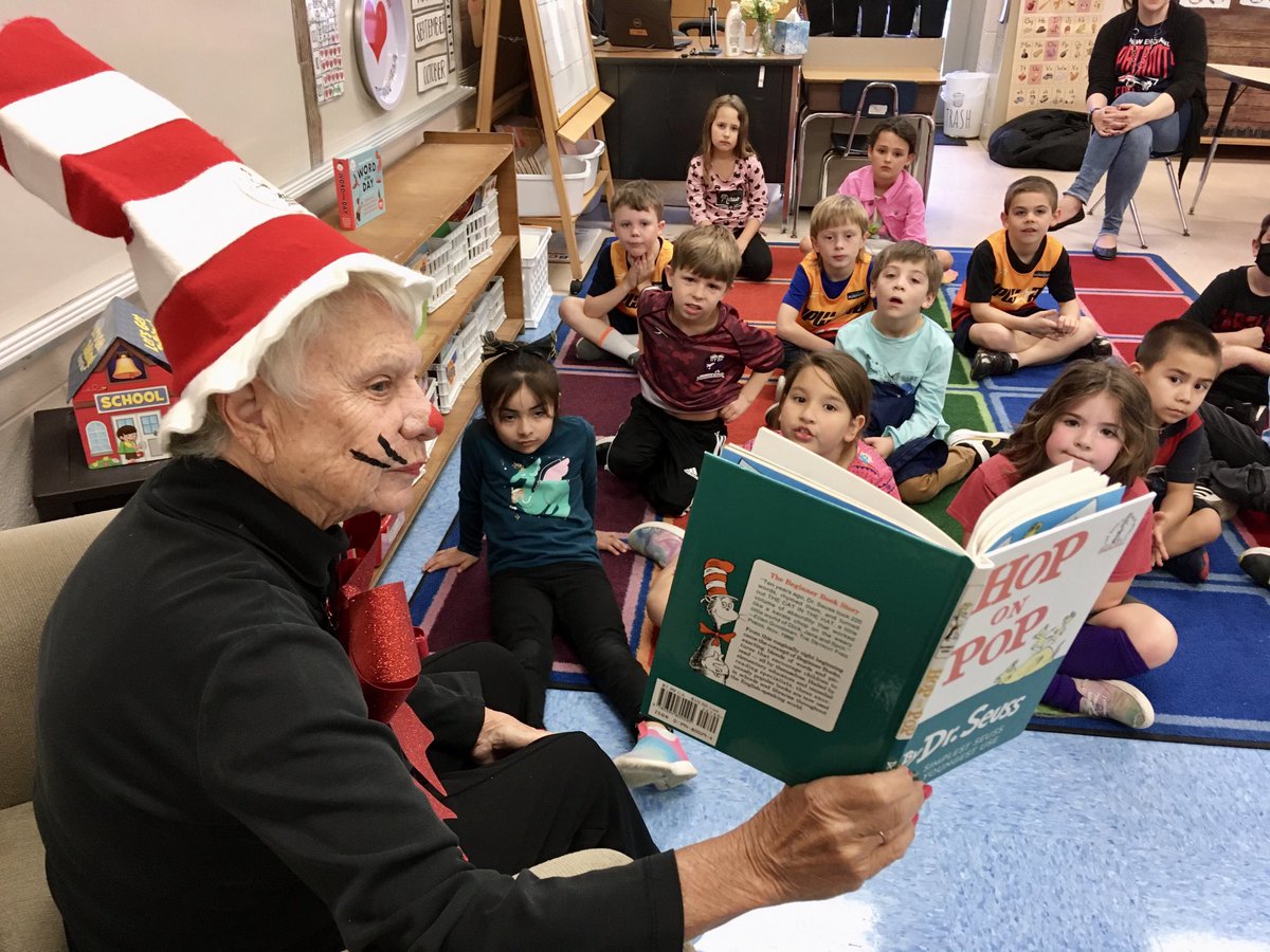 CherylCCNT's tweet photo. Retired teacher Bonnie Ferneau reads a Dr. Seuss book to Morehead City Primary School first-graders Wednesday in celebration of Read Across America. (Cheryl Burke photo) https://t.co/KQfyPopAA8