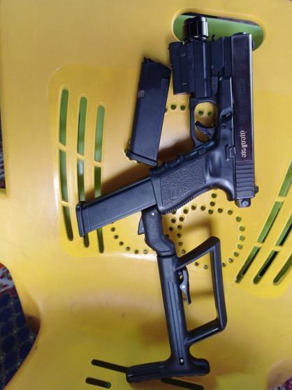 A FAB Defense (or Wish.com airsoft copy) carbine kit for the Glock 17/19 for sale in Syria with the owners name (Abd el Moeen) engraved on it. Note the full auto plate also commonly seen on Wish.com