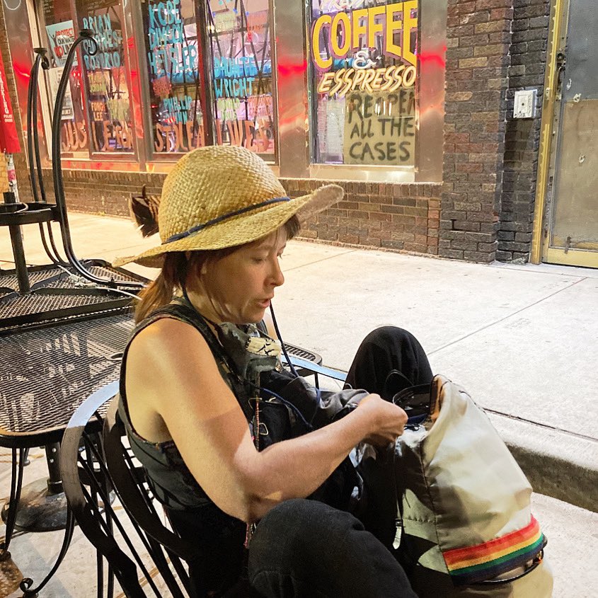 happifydesign's tweet photo. Ok, my day 1 of #mendmarch (prompt: I am) is me sitting in a parklet outside of Hard Times sewing my beloved dead cousin’s pants pocket onto the bib of my overalls (after removing a fake pocket), while wearing my favorite hat shortly before I lost it on Hennepin early last fall. https://t.co/QrOPCA7IXL