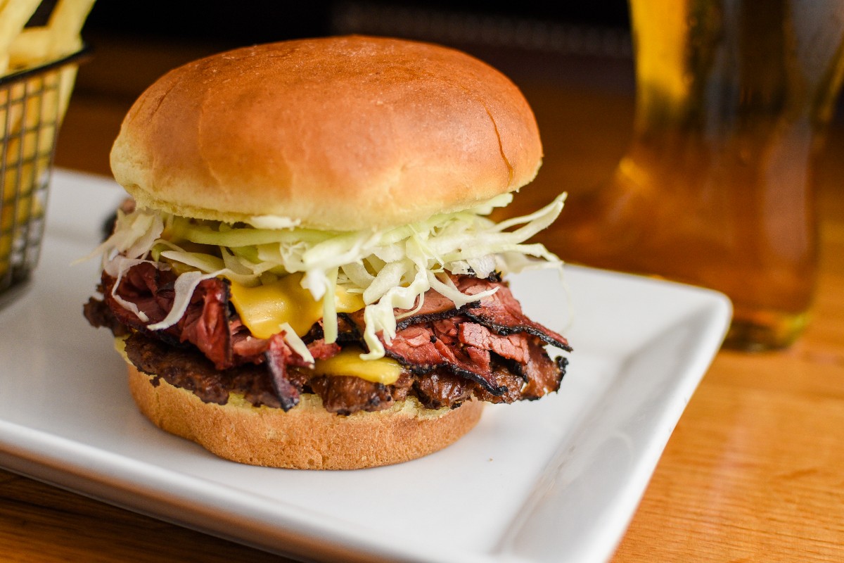 miller_time_pub's tweet photo. Stop in soon for our featured burger of the month, the Rachel Burger! Enjoy a beef patty piled high with smoked pastrami, American cheese, shredded cabbage and Rachel sauce. 🍔 💖 https://t.co/vXkFygXSai
