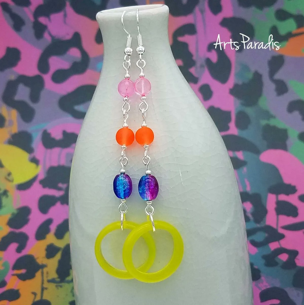 Now here's a design that just screams 80s to me. So I had to use the fun rainbow leopard print background, obviously. I feel like everything about this just screams Lisa Frank! ArtsParadis.com #handmadejewelry #womanowned #LGBTQowned #proudartist #LisaFrank #80sgirl