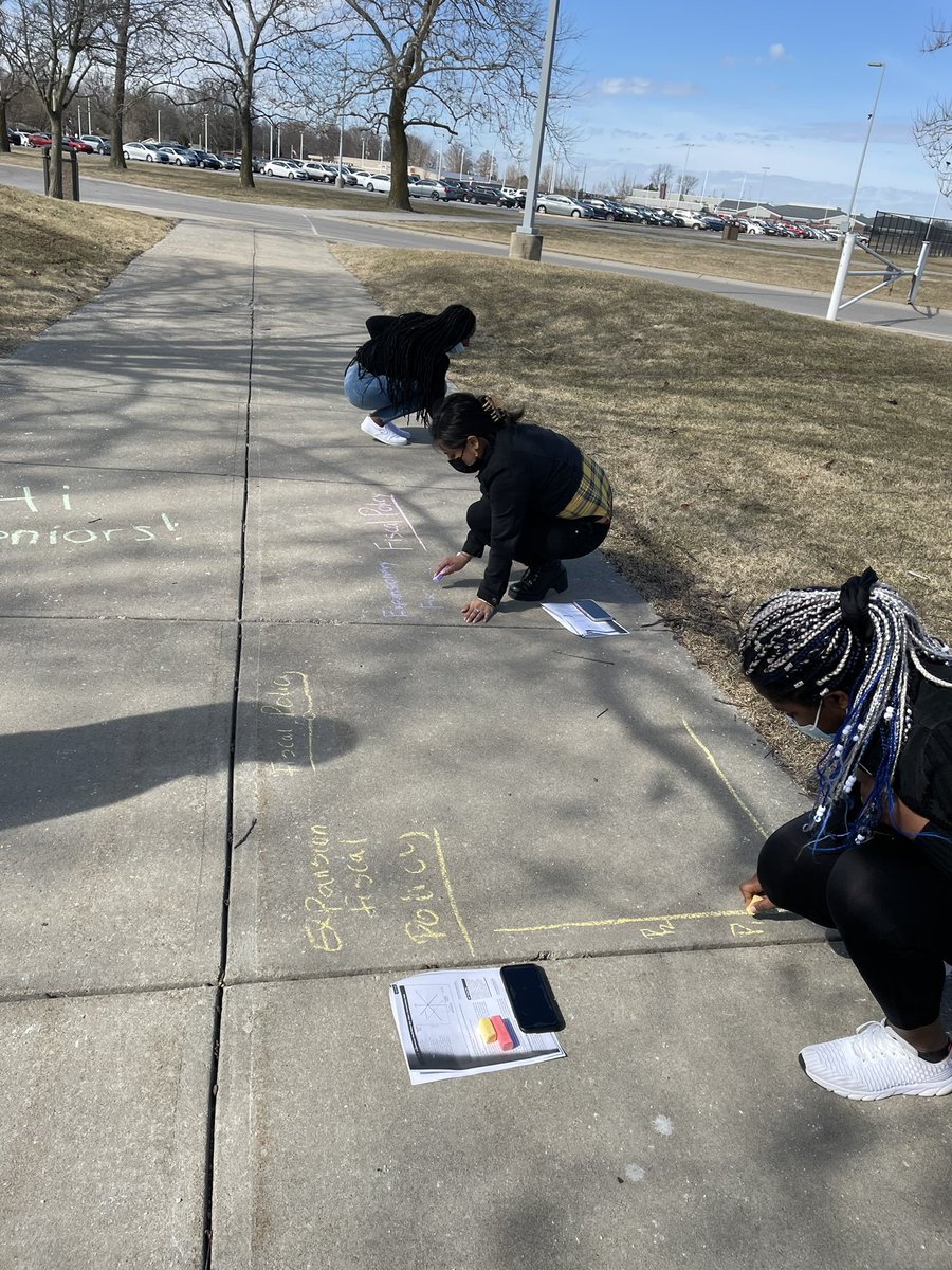 Simsy716's tweet photo. When it’s a nice day in March, you take advantage of it for class! Expansionary &amp; contractionary fiscal policy graphs! #pikehighschool https://t.co/FIX6lOcAc1