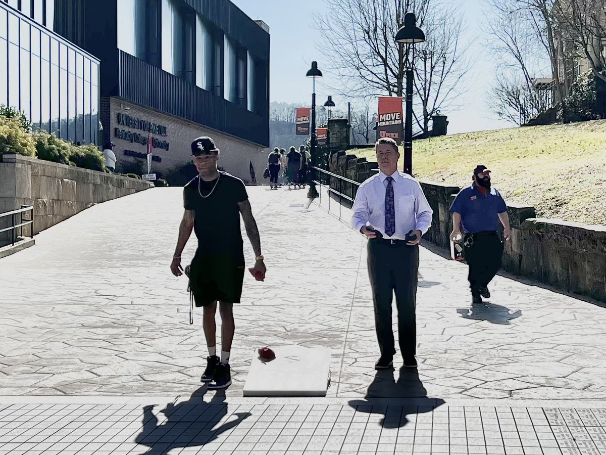 lori_werth's tweet photo. Thinking the spring temps today are outstanding!! Spotted @DrBWebb on the plaza! #CornholeFun #UPIKECornhole https://t.co/MKjGTjtVNE