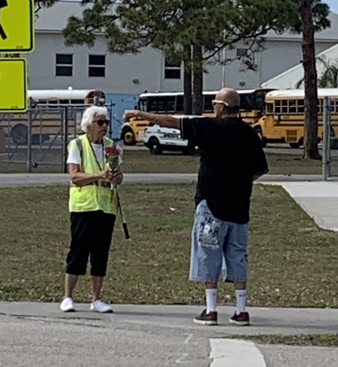 A parent pulled over to give roses 🌹 to our crossing guard, Ms. Bobbie. We love her! <a href="/VillasElem/">Villas Elementary</a> #crossingguard