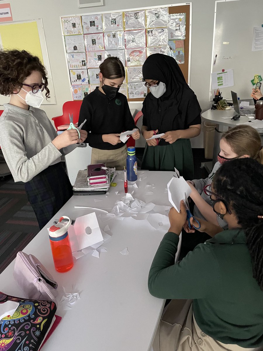 NMMSBUFFALO's tweet photo. Leadership takes active listening to work! These kiddos broke up into groups to guide each other on making the same style snowflakes while trying to use various active listening techniques! They were pretty successful! https://t.co/XOelRJMeEM