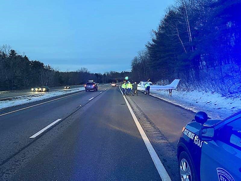 MassStatePolice's tweet photo. #MAtraffic small plane has made a successful emergency landing on Rt 91 in #Greenfield due to mechanical failure. No crash-no injuries to the two occupants. No vehicles involved. Troopers assisted rotating the plane for traffic to pass. Crews en route to remove plane. FAA advised https://t.co/BhFId2TWbk